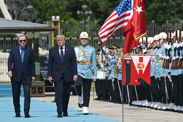 Turkish President Recep Tayyip Erdogan (L) hosts US President Donald Trump for a state arrival ceremony at Bestepe Presidential Compound in Ankara, on July 7, 2026, on the sidelines of the NATO Summit. (Photo by SAUL LOEB / AFP)