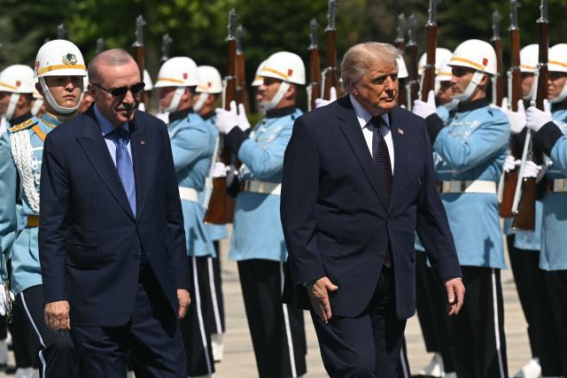 Turkish President Recep Tayyip Erdogan (L) hosts US President Donald Trump for a state arrival ceremony at Bestepe Presidential Compound in Ankara, on July 7, 2026, on the sidelines of the NATO Summit. (Photo by SAUL LOEB / AFP)