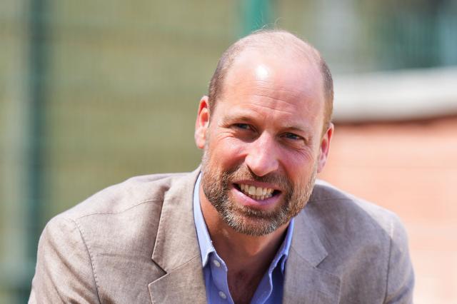Britain's Prince William, Prince of Wales smiles during a visit to the Ysgol Gymraeg Llundain (The London Welsh School) in Hanwell, West London on July 7, 2026 as he joins pupils in sending their best wishes to Team Wales ahead of the Glasgow 2026 Commonwealth Games. (Photo by Aaron Chown / POOL / AFP)