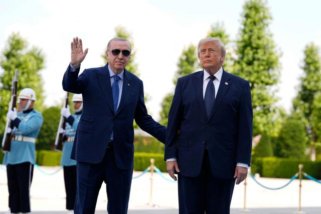 Turkish President Recep Tayyip Erdogan (L) hosts US President Donald Trump for a state arrival ceremony at Bestepe Presidential Compound in Ankara on July 7, 2026, on the sidelines of the NATO Summit. (Photo by Emrah Gurel / POOL / AFP)