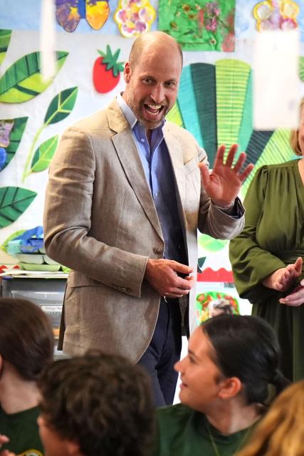Britain's Prince William, Prince of Wales smiles during a visit to the Ysgol Gymraeg Llundain (The London Welsh School) in Hanwell, West London on July 7, 2026 as he joins pupils in sending their best wishes to Team Wales ahead of the Glasgow 2026 Commonwealth Games. (Photo by Aaron Chown / POOL / AFP)