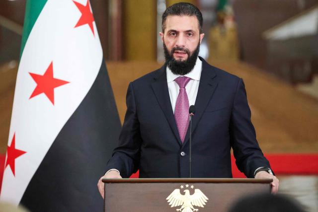 Syrian President Ahmed al-Sharaa speaks during a joint press conference with France's President in Damascus on July 7, 2026. French President Emmanuel Macron arrived in Damascus on July 6, 2026 for the first visit by a Western European head of state since Syria's new authorities took power in 2024, an AFP journalist said. Macron, who will depart on July 7, 2026, will advocate for "a free, pluralist Syria that respects each of its components" and plays a role in moderating Middle East tensions, the French presidency told journalists ahead of his arrival. (Photo by Ludovic MARIN / POOL / AFP)