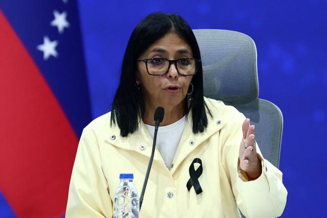 (FILES) Venezuela's interim President Delcy Rodriguez speaks during a press conference at the Generalisimo Francisco de Miranda Air Base in Caracas on July 2, 2026. Venezuela's interim President Delcy Rodriguez said on July 7 that Caracas international airport damaged in the twin earthquakes would reopen as soon as possible using an alternative runway. (Photo by Lucas AGUAYO / AFP)
