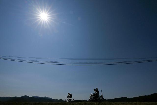 Cofidis team's Luxembourgish rider Alex Kirsch cycles to join the leadind riders during the 4th stage of the 113th edition of the Tour de France cycling race, 181,9 km between Carcassonne and Foix in southwestern France, on July 7, 2026. (Photo by Loic VENANCE / AFP)