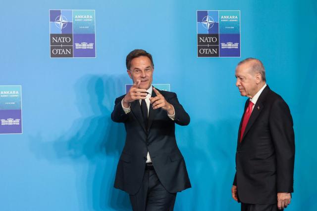 NATO Secretary General Mark Rutte and Turkey's President Recep Tayyip Erdogan (R) arrive for a NATO Summit at Bestepe Presidential Compound in Ankara, Turkey, July 8, 2026. The summit comes at a fraught time for the 77-year-old transatlantic alliance, with the US President demanding members make good on a pledge to ramp up defence spending as Washington takes a step back from Europe. (Photo by Ludovic MARIN / POOL / AFP)