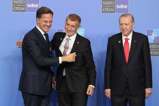NATO Secretary General Mark Rutte (L) and Turkey's President Recep Tayyip Erdogan greet Czech Republic's Prime Minister Andrej Babis as he arrives for a NATO Summit at Bestepe Presidential Compound in Ankara, Turkey, July 8, 2026. The summit comes at a fraught time for the 77-year-old transatlantic alliance, with the US President demanding members make good on a pledge to ramp up defence spending as Washington takes a step back from Europe. (Photo by Ludovic MARIN / POOL / AFP)