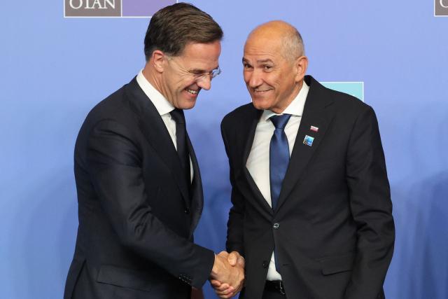 NATO Secretary General Mark Rutte (L) greets Slovenia's President Janez Jansa as he arrives for a NATO Summit at Bestepe Presidential Compound in Ankara, Turkey, July 8, 2026. The summit comes at a fraught time for the 77-year-old transatlantic alliance, with the US President demanding members make good on a pledge to ramp up defence spending as Washington takes a step back from Europe. (Photo by Ludovic MARIN / POOL / AFP)