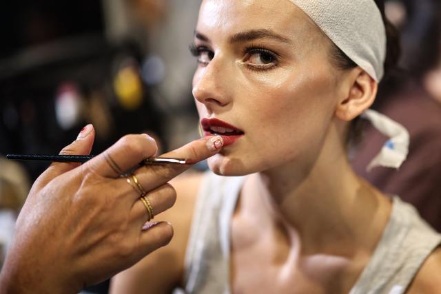 A model gets ready in the backstage ahead of the Elie Saab Women Haute Couture Fall/Winter 2026-2027 collection as part of the Paris Fashion Week, in Paris, on July 8, 2026. (Photo by SIMON WOHLFAHRT / AFP)