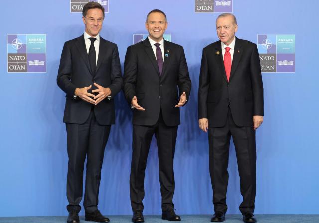 NATO Secretary General Mark Rutte (L) and Turkey's President Recep Tayyip Erdogan greet Poland's President Karol Nawrocki as he arrives for a NATO Summit at Bestepe Presidential Compound in Ankara, Turkey, July 8, 2026. The summit comes at a fraught time for the 77-year-old transatlantic alliance, with the US President demanding members make good on a pledge to ramp up defence spending as Washington takes a step back from Europe. (Photo by Ludovic MARIN / POOL / AFP)