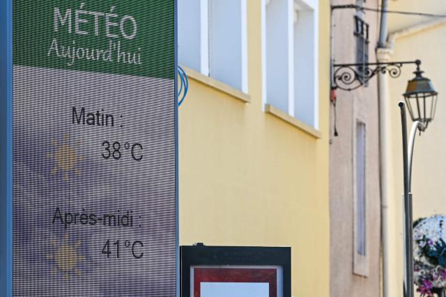 This photograph shows a weather forecast screen which predicts temperatures of 38 degrees Celsius in the morning and 41 in the afternoon in Villeneuve-les-Beziers, southern France, on July 8, 2026. (Photo by Gabriel BOUYS / AFP)