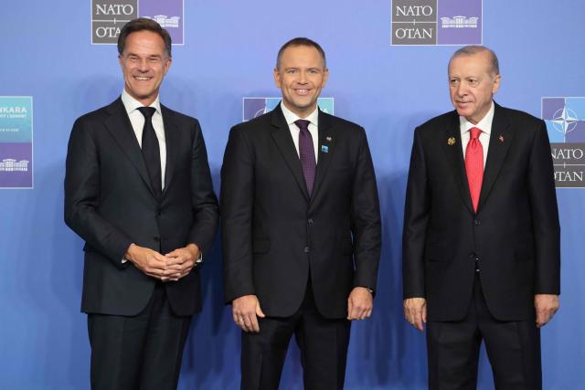 NATO Secretary General Mark Rutte (L) and Turkey's President Recep Tayyip Erdogan greet Poland's President Karol Nawrocki as he arrives for a NATO Summit at Bestepe Presidential Compound in Ankara, Turkey, July 8, 2026. The summit comes at a fraught time for the 77-year-old transatlantic alliance, with the US President demanding members make good on a pledge to ramp up defence spending as Washington takes a step back from Europe. (Photo by Ludovic MARIN / POOL / AFP)