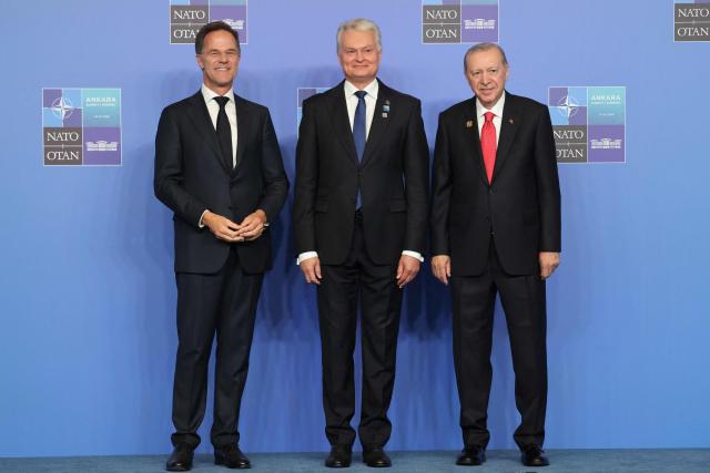 NATO Secretary General Mark Rutte (L) and Turkey's President Recep Tayyip Erdogan greet Lithuania's President Gitanas Nauseda as he arrives for a NATO Summit at Bestepe Presidential Compound in Ankara, Turkey, July 8, 2026. The summit comes at a fraught time for the 77-year-old transatlantic alliance, with the US President demanding members make good on a pledge to ramp up defence spending as Washington takes a step back from Europe. (Photo by Ludovic MARIN / POOL / AFP)