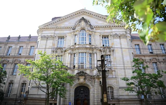 (FILES) A general overview shows the Regional Court in Berlin, on July 14, 2025, on the first day of the trial of a palliative care doctor allegedly accused of killing 15 patients with lethal injections. A German palliative care doctor was sentenced to life in prison by a court in Berlin on July 8, 2026 for murdering 15 people with lethal doses of sedatives. (Photo by Tobias Schwarz / AFP)