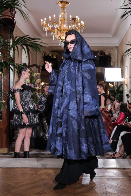 A model presents a creation by Franck Sorbier for the Women Haute Couture Fall/Winter 2026-2027 collection as part of the Paris Fashion Week, in Paris, on July 8, 2026. (Photo by Kenzo TRIBOUILLARD / AFP)