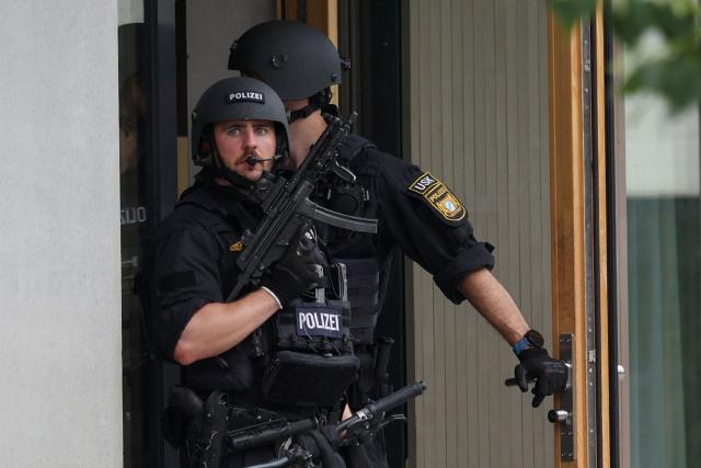 Support Command stand at an entrance of a secondary school Schongau, in the southern German state of Bavaria, where several people have been wounded and a suspect arrested in an attack on July 8, 2026. The perpetrator appeared to have deliberately targeted the school in a suspected "rampage", a police spokeswoman told AFP. (Photo by Karl-Josef Hildenbrand / dpa / AFP) / Germany OUT