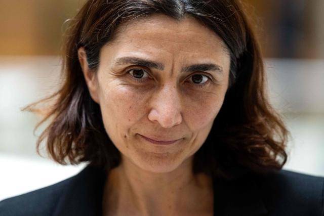 Deniz Igan, Division Chief in the International Monetary Fund (IMF)s Research Department speaks during an AFP interview at the IMF Headquarters in Washington, DC, on July 7, 2026. The IMF on July 8, 2026, cut its 2026 growth projection for the world economy again, saying an AI boom has not fully offset the fallout from war in the Middle East. Deniz Igan, division chief at the IMF's research department, told AFP that its forecasts are "broadly unchanged" cumulatively for the next two years and described the bounceback as "a V-shaped recovery." The delayed recovery from war on Iran, longer disruptions and higher prices is part of the reason the world economy will take a bigger hit this year, she added. (Photo by Kent Nishimura / AFP)