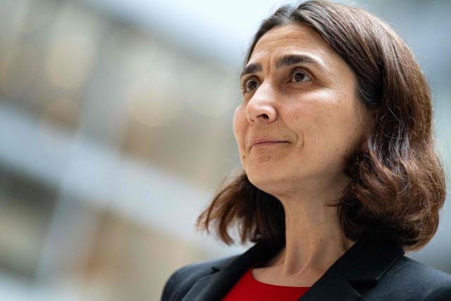 Deniz Igan, Division Chief in the International Monetary Fund (IMF)s Research Department speaks during an AFP interview at the IMF Headquarters in Washington, DC, on July 7, 2026. The IMF on July 8, 2026, cut its 2026 growth projection for the world economy again, saying an AI boom has not fully offset the fallout from war in the Middle East. Deniz Igan, division chief at the IMF's research department, told AFP that its forecasts are "broadly unchanged" cumulatively for the next two years and described the bounceback as "a V-shaped recovery." The delayed recovery from war on Iran, longer disruptions and higher prices is part of the reason the world economy will take a bigger hit this year, she added. (Photo by Kent Nishimura / AFP)