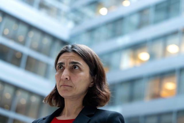 Deniz Igan, Division Chief in the International Monetary Fund (IMF)s Research Department speaks during an AFP interview at the IMF Headquarters in Washington, DC, on July 7, 2026. The IMF on July 8, 2026, cut its 2026 growth projection for the world economy again, saying an AI boom has not fully offset the fallout from war in the Middle East. Deniz Igan, division chief at the IMF's research department, told AFP that its forecasts are "broadly unchanged" cumulatively for the next two years and described the bounceback as "a V-shaped recovery." The delayed recovery from war on Iran, longer disruptions and higher prices is part of the reason the world economy will take a bigger hit this year, she added. (Photo by Kent Nishimura / AFP)