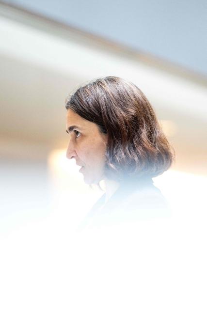 Deniz Igan, Division Chief in the International Monetary Fund (IMF)s Research Department speaks during an AFP interview at the IMF Headquarters in Washington, DC, on July 7, 2026. The IMF on July 8, 2026, cut its 2026 growth projection for the world economy again, saying an AI boom has not fully offset the fallout from war in the Middle East. Deniz Igan, division chief at the IMF's research department, told AFP that its forecasts are "broadly unchanged" cumulatively for the next two years and described the bounceback as "a V-shaped recovery." The delayed recovery from war on Iran, longer disruptions and higher prices is part of the reason the world economy will take a bigger hit this year, she added. (Photo by Kent Nishimura / AFP)