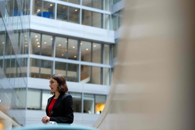 Deniz Igan, Division Chief in the International Monetary Fund (IMF)s Research Department speaks during an AFP interview at the IMF Headquarters in Washington, DC, on July 7, 2026. The IMF on July 8, 2026, cut its 2026 growth projection for the world economy again, saying an AI boom has not fully offset the fallout from war in the Middle East. Deniz Igan, division chief at the IMF's research department, told AFP that its forecasts are "broadly unchanged" cumulatively for the next two years and described the bounceback as "a V-shaped recovery." The delayed recovery from war on Iran, longer disruptions and higher prices is part of the reason the world economy will take a bigger hit this year, she added. (Photo by Kent Nishimura / AFP)