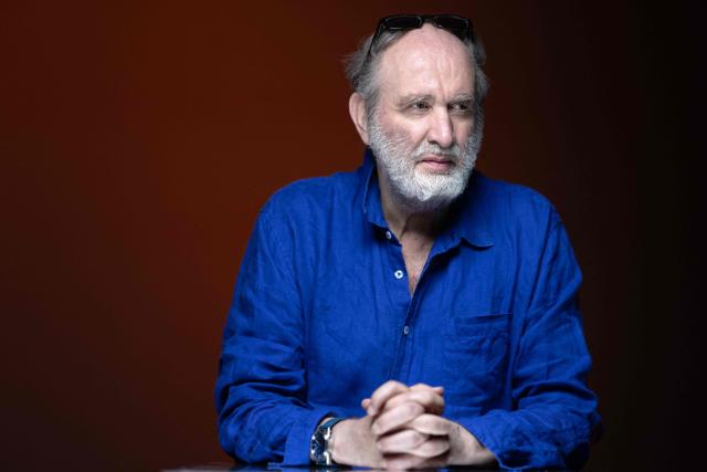 French novelist and screenwriter Serge Joncour poses during a photo session in Paris on July 7, 2026. (Photo by Joel Saget / AFP)