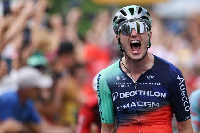 Decathlon CMA CGM Team's Dutch rider Olav Kooij cycles to the finish line to win the 5th stageof the 113th edition of the Tour de France cycling race, 158 km between Lannemezan and Pau in southwestern France, on July 8, 2026. (Photo by Anne-Christine POUJOULAT / AFP)
