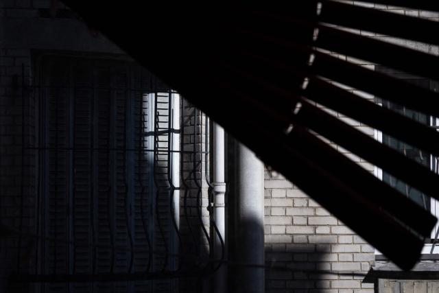 This photograph shows closed shutters in Paris, on July 8, 2026. (Photo by JOEL SAGET / AFP)