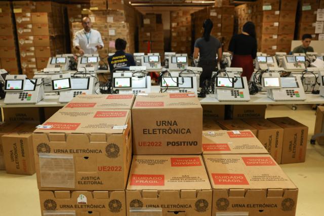 Staff members of the Amazonas Regional Electoral Court (TRE/AM) test electronic voting machines in Manaus, Amazonas state, Brazil, on July 8, 2026. (Photo by MICHAEL DANTAS / AFP)