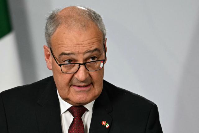 Switzerland's President of the Confederation and Economy Minister Guy Parmelin speaks during a joint press conference with Mexico's President Claudia Sheinbaum (out of frame) at the National Palace in Mexico City on July 8, 2026. (Photo by Yuri CORTEZ / AFP)
