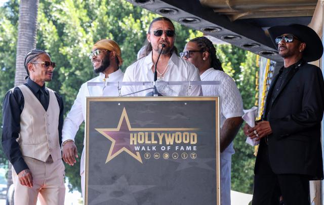 US rapper Bizzy Bone from hip hop group "Bone Thugs-N-Harmony" speaks during the group's Hollywood Walk of Fame star ceremony in the Hollywood neighborhood of Los Angeles on July 8, 2026. (Photo by VALERIE MACON / AFP)