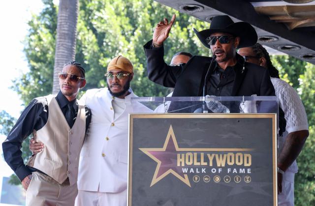 US rapper Krayzie Bone from hip hop group "Bone Thugs-N-Harmony" speaks during the group's Hollywood Walk of Fame star ceremony in the Hollywood neighborhood of Los Angeles on July 8, 2026. (Photo by VALERIE MACON / AFP)