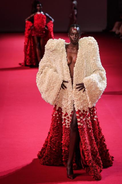 A model presents a creation by Manish Malhotra for the Women Haute Couture Fall/Winter 2026-2027 collection as part of the Paris Fashion Week, in Paris, on July 8, 2026. (Photo by Kenzo TRIBOUILLARD / AFP)