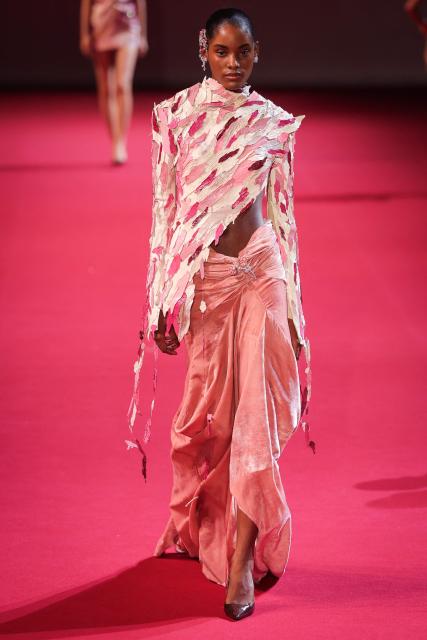 A model presents a creation by Manish Malhotra for the Women Haute Couture Fall/Winter 2026-2027 collection as part of the Paris Fashion Week, in Paris, on July 8, 2026. (Photo by Kenzo TRIBOUILLARD / AFP)