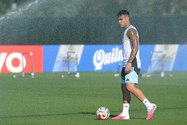 Argentina's forward #22 Lautaro Martinez under water sprinkler takes part in a training session at the Sporting KC Stadium in Kansas City on July 8, 2026, during the 2026 World Cup tournament. (Photo by JUAN MABROMATA / AFP)