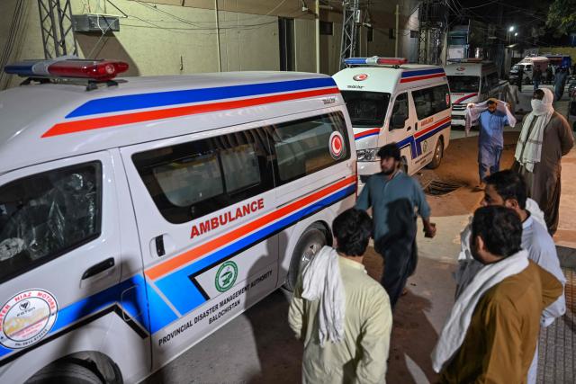 Ambulances are parked outside a hospital after transporting the coffins of police personnel killed in recent militant attacks in Quetta on July 9, 2026. Three militant attacks in Pakistan's southwestern Balochistan province have killed 42 civilians and security personnel in four days, the country's military said on July 8. (Photo by Banaras KHAN / AFP)