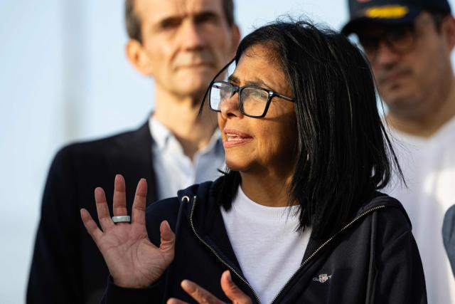 (FILES) Venezuela's interim President Delcy Rodriguez gestures as she visits a temporary camp of the French Civil Security in La Guaira, La Guaira state, on July 1, 2026, following the June 24 twin earthquakes in Venezuela. Venezuela's interim President, Delcy Rodriguez, announced on television on July 8, that she had written to King Charles III of England to request the release of some 30 tonnes of Venezuelan gold frozen in the United Kingdom as part of sanctions against the country, so that it could be used to help rebuild the country following the twin earthquakes. (Photo by Miguel MEDINA / POOL / AFP)