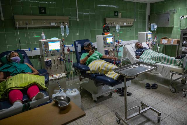 Cuban patients with renal failure receive haemodialysis treatment at the Hermanos Ameijeiras Clinical Surgical Hospital in Havana, Cuba, on July 2, 2026. In the midst of one of the worst economic crises Cuba has experienced in decades, the health system is striving to maintain its services and priority programmes despite medicine and supply shortages, technological deterioration, staff shortages, prolonged power cuts and the impact of the United States sanctions. (Photo by YAMIL LAGE / AFP)