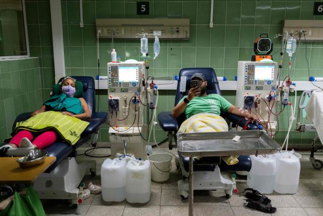 Patients with renal failure receive haemodialysis treatment at the Hermanos Ameijeiras Clinical Surgical Hospital in Havana, Cuba, on July 2, 2026. In the midst of one of the worst economic crises Cuba has experienced in decades, the health system is striving to maintain its services and priority programmes despite medicine and supply shortages, technological deterioration, staff shortages, prolonged power cuts and the impact of the United States sanctions. (Photo by YAMIL LAGE / AFP)