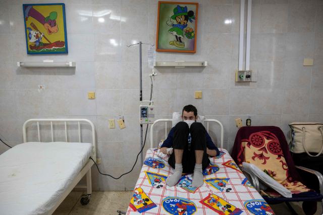 A cancer patient remains admitted to a room at the Institute of Oncology and Radiobiology in Havana on July 2, 2026. In the midst of one of the worst economic crises Cuba has experienced in decades, the health system is striving to maintain its services and priority programmes despite medicine and supply shortages, technological deterioration, staff shortages, prolonged power cuts and the impact of the United States sanctions. (Photo by YAMIL LAGE / AFP)