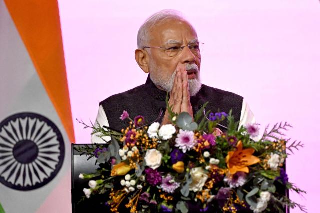 Indian Prime Minister Narendra Modi speaks at the Australia-India Economic Roadmap Business Reception in Melbourne on July 9, 2026. (Photo by WILLIAM WEST / AFP)