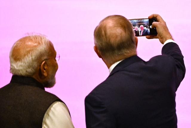 Australia’s Prime Minister Anthony Albanese (R) takes a selfie with Indian Prime Minister Narendra Modi (L) at the Australia-India Economic Roadmap Business Reception in Melbourne on July 9, 2026. (Photo by WILLIAM WEST / AFP)