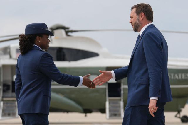 US Vice President JD Vance is greeted as he steps off Air Force Two at Joint Base Andrews, Maryland, on July 8, 2026. (Photo by Mark Schiefelbein / POOL / AFP)