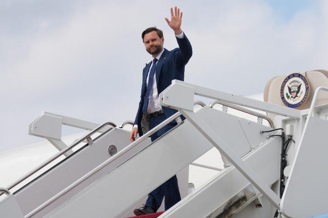 US Vice President JD Vance steps off Air Force Two at Joint Base Andrews, Maryland, on July 8, 2026. (Photo by Mark Schiefelbein / POOL / AFP)