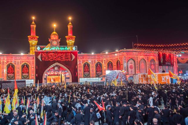 Mourners take part in the funeral procession of Iran's late supreme leader Ayatollah Ali Khamenei near the shrine of Imam Hussein in the Iraqi holy city of Karbala on July 9, 2026. Iranians were preparing on July 9 to bury their slain leader Ali Khamenei in his hometown of Mashhad in northeast Iran, as new US strikes threatened to trigger a fresh escalation in the Middle East war. The late leader's burial follows a multi-day funeral ceremony that attracted millions of mourners across various cities in both Iran and Iraq. (Photo by murtadha ridha / AFP)