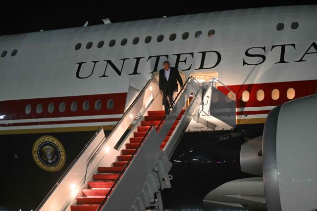 US President Donald Trump disembarks from Air Force One upon arrival at Joint Base Andrews, Maryland on July 9, 2026. Trump is returning from the NATO Summit in Turkey. (Photo by SAUL LOEB / AFP)