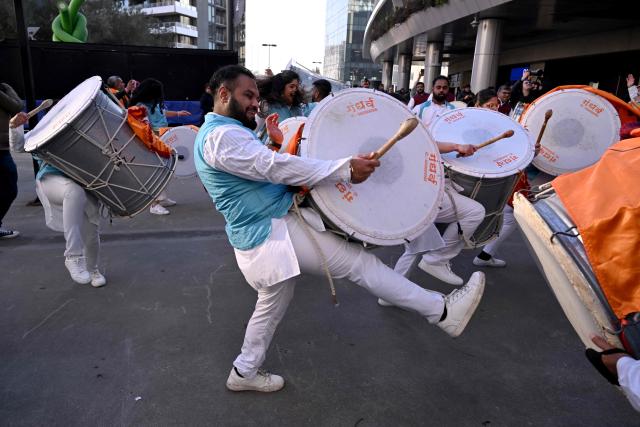 Performers play drums outside the venue for a community event with Indian Prime Minister Narendra Modi at Docklands Stadium in Melbourne on July 9, 2026. (Photo by WILLIAM WEST / AFP)