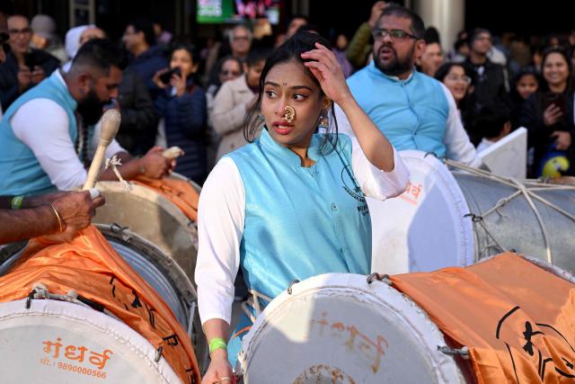 Performers prepare to play drums outside the venue for a community event with Indian Prime Minister Narendra Modi at Docklands Stadium in Melbourne on July 9, 2026. (Photo by WILLIAM WEST / AFP)