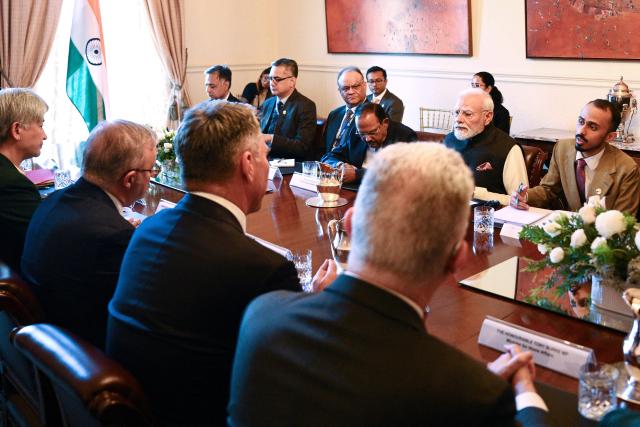 Australia's Prime Minister Anthony Albanese (2nd L) and India's Prime Minister Narendra Modi (2nd R), along with other officials, attend the Australia-India Annual Leaders’ Summit at Government House Victoria on July 09, 2026. (Photo by Izhar KHAN / POOL / AFP)