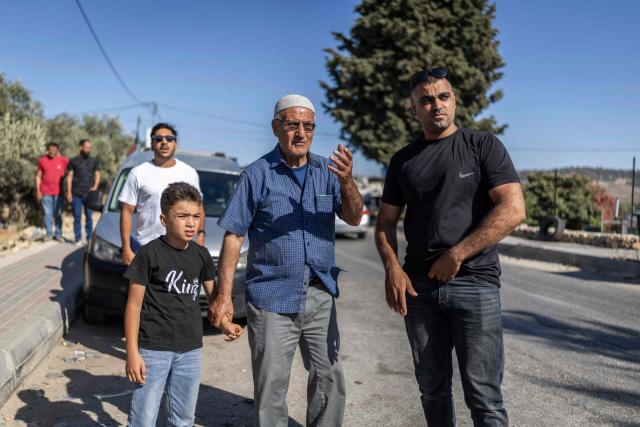 Relatives and family members of Palestinian prisoners, await their release from Israeli prison at the checkpoint on the outskirts of Israeli occupied West Bank city of Ramallah on July 8, 2026. The number of Palestinian detainees in Israeli prisons stands at around 9,500, according to figures released in June by the Palestinian Prisoners Club, the main rights group for Palestinian prisoners. Since the start of the Gaza war in October 2023, violence has escalated in the Israeli-occupied West Bank. (Photo by ilia YEFIMOVICH / AFP)