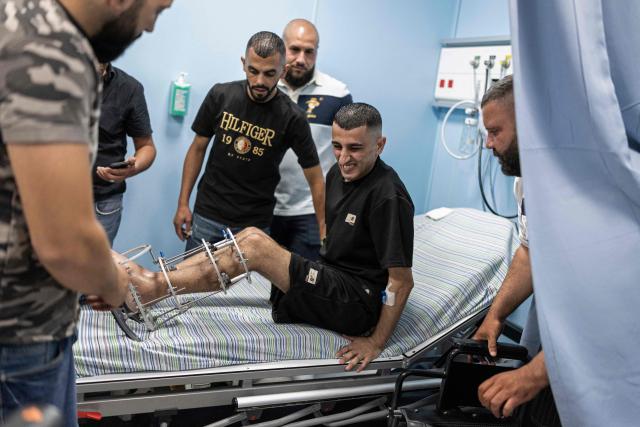 Palestinian Yaqub Al-Saber is pictured at the hospital following his release from Israeli prison in the Israeli occupied West Bank city of Ramallah on July 8, 2026. The number of Palestinian detainees in Israeli prisons stands at around 9,500, according to figures released in June by the Palestinian Prisoners Club, the main rights group for Palestinian prisoners. Since the start of the Gaza war in October 2023, violence has escalated in the Israeli-occupied West Bank. (Photo by ilia YEFIMOVICH / AFP)
